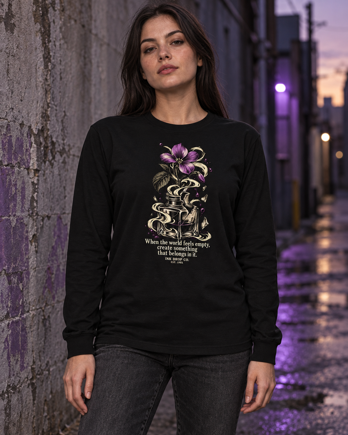 Women’s long-sleeve graphic tee, black with floral chest artwork and quote text