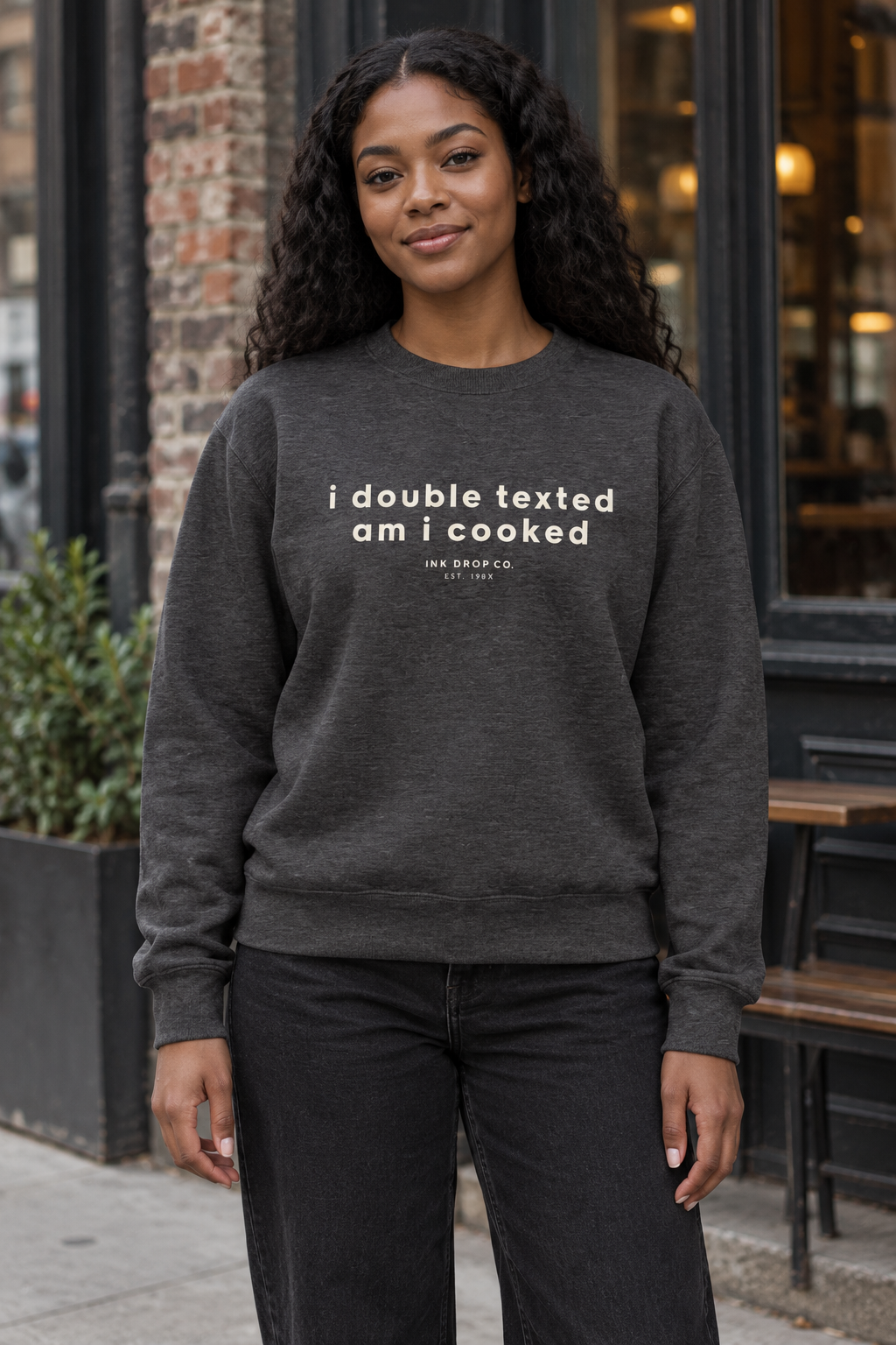 Unisex crewneck sweatshirt in charcoal heather with front graphic text