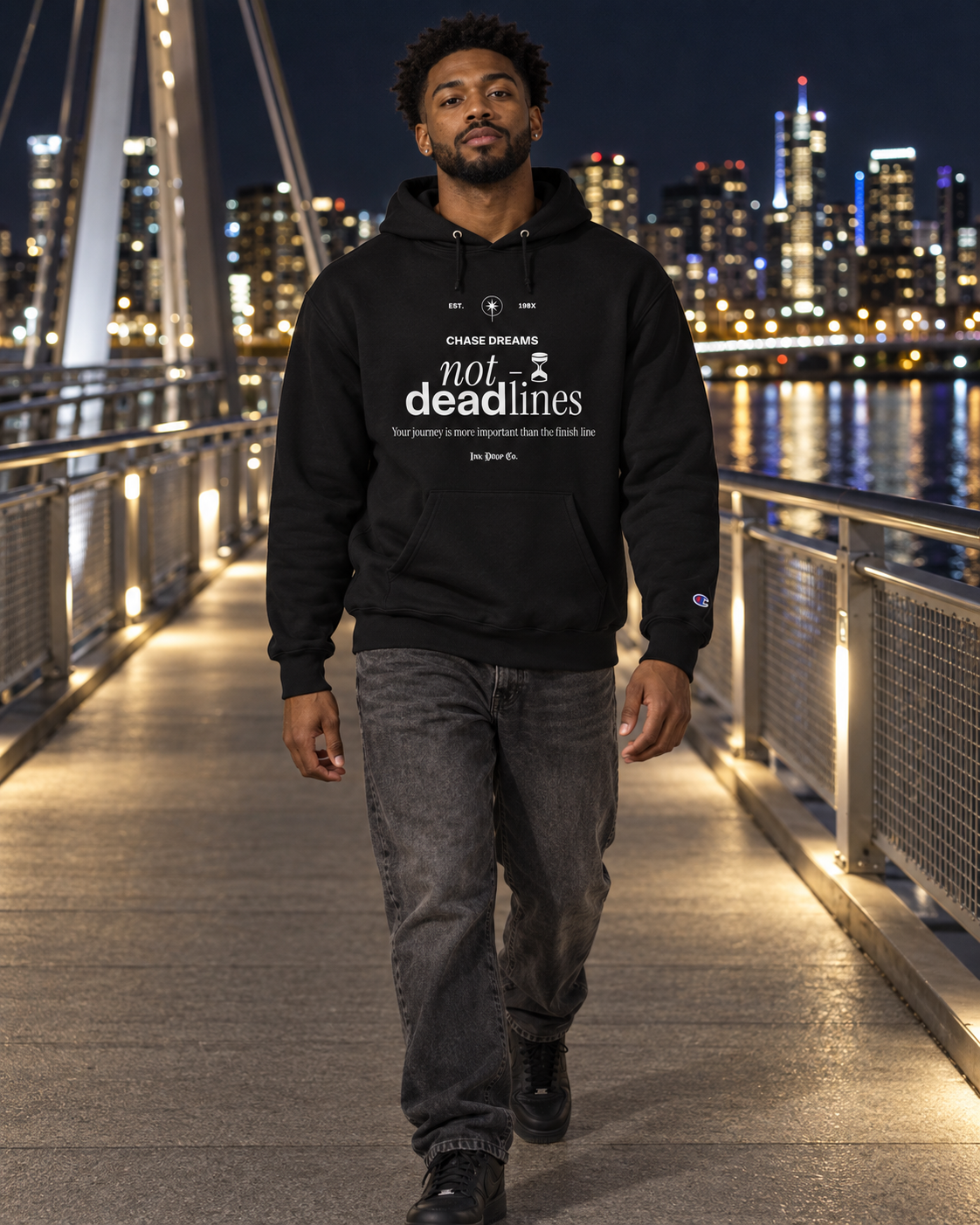 Black pullover hoodie with chest 'not deadlines' graphic and hood drawstrings