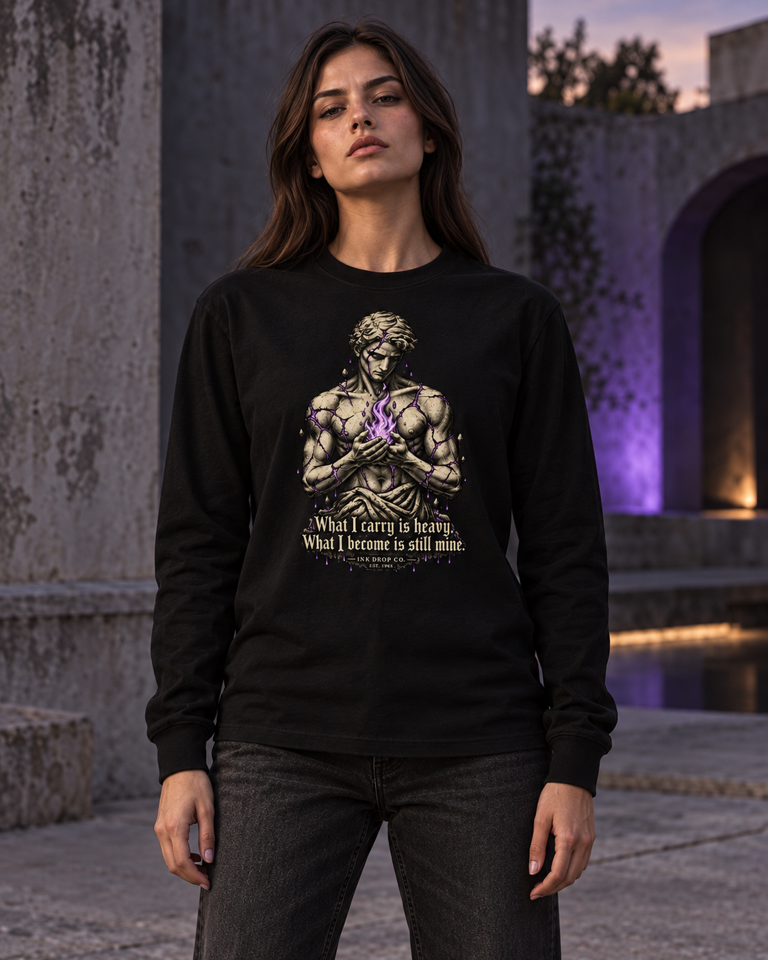 Unisex black long-sleeve graphic tee worn by model, front portrait and quote visible.