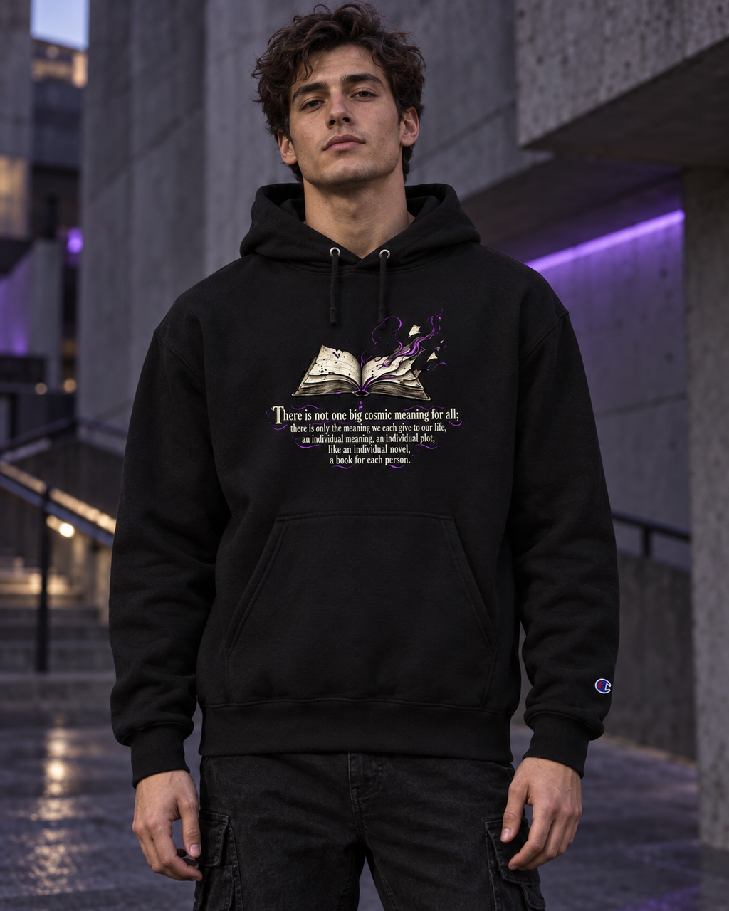 Unisex black pullover hoodie on model, featuring hood, kangaroo pocket, and story graphic