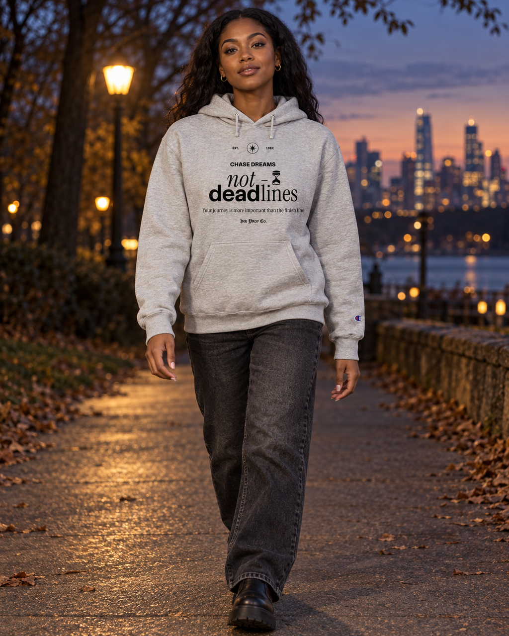 Gray Champion hoodie with 'not deadlines' chest text, hood drawstrings, and kangaroo pocket