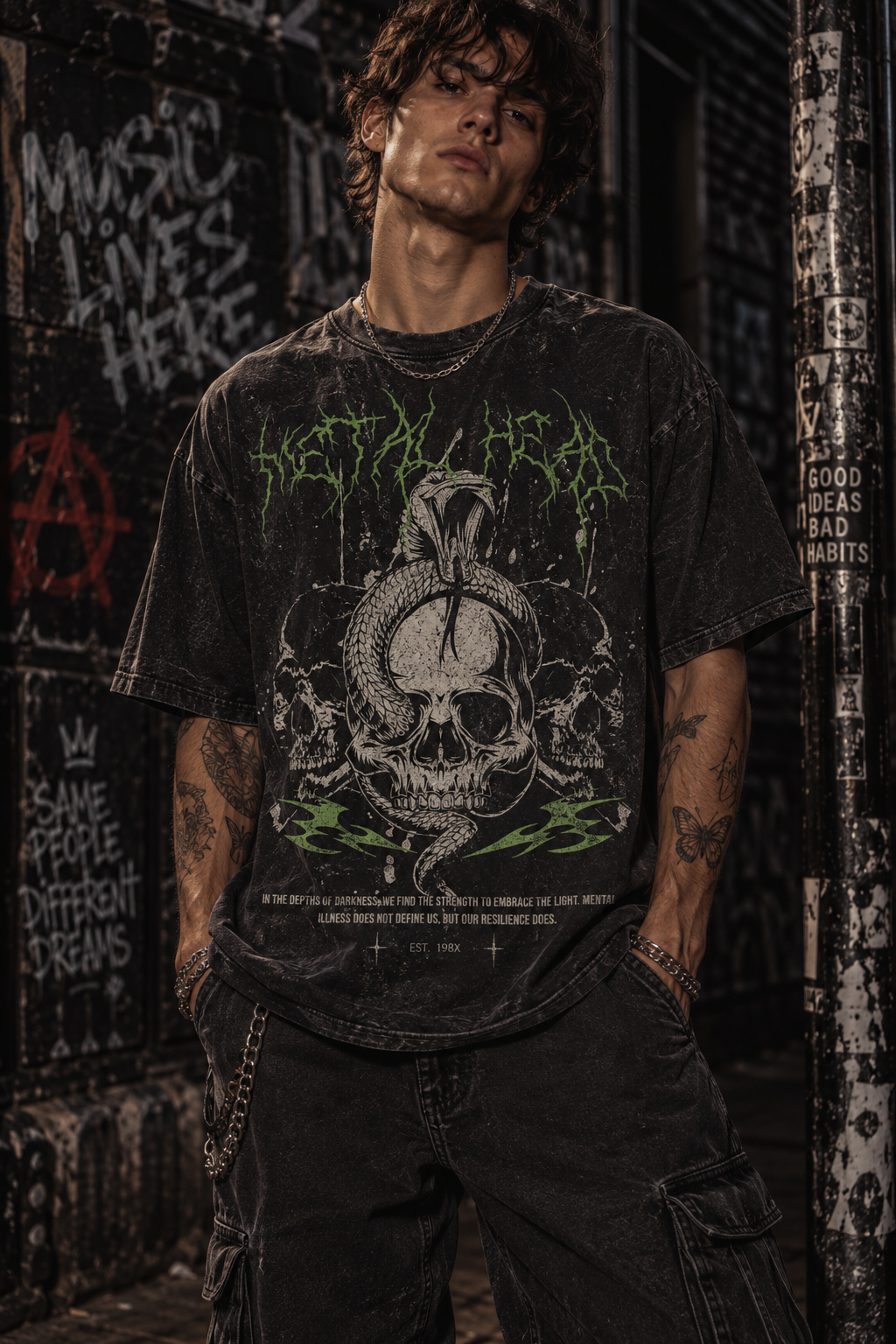 Metal head graphic tee in dark color with neon skull head front graphic