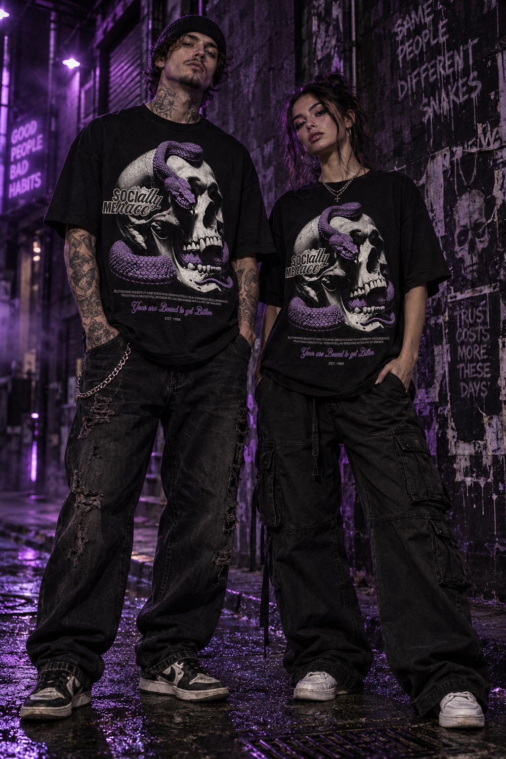 Black crew-neck graphic T-shirt with purple skull face print, worn by two