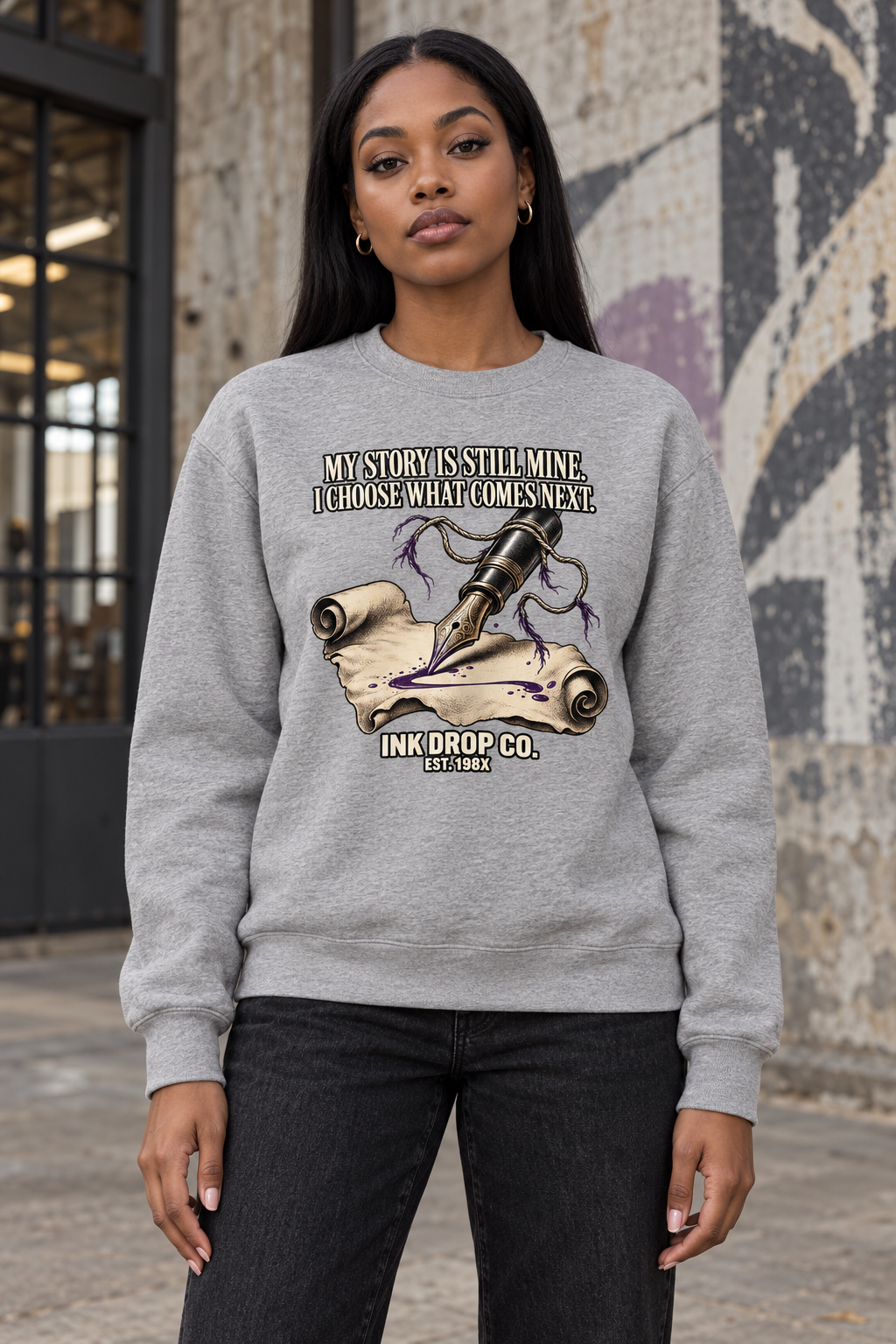 Light heather gray unisex crewneck sweatshirt with front graphic print, front view.