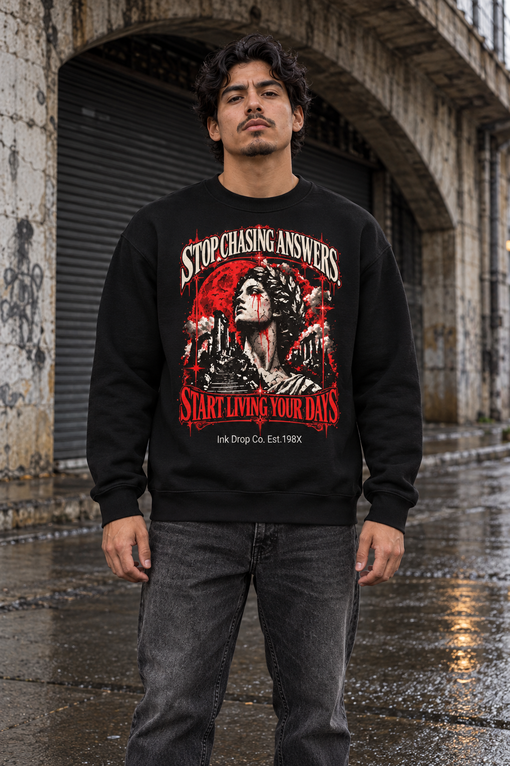 Black unisex crewneck sweatshirt with red-and-white face graphic front, long sleeves