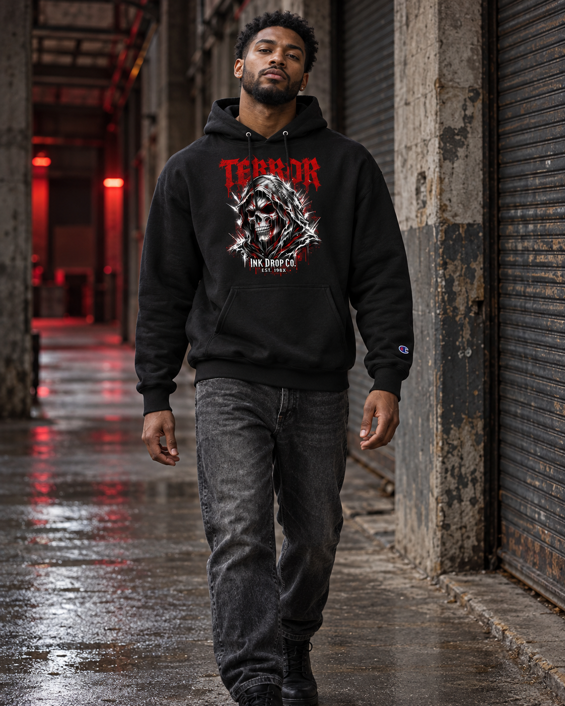 Black unisex hoodie with front skull graphic and kangaroo pocket