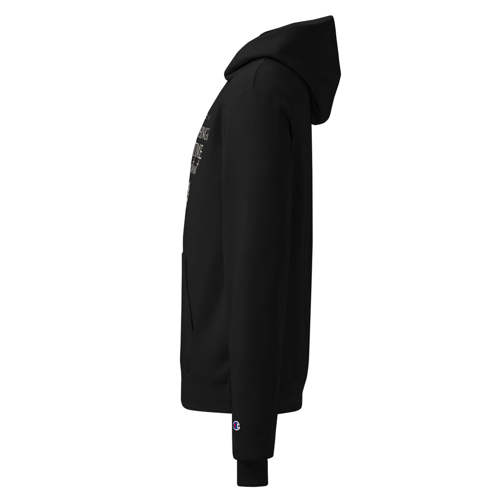 Black unisex pullover hoodie, side view with hood and small sleeve logo detail