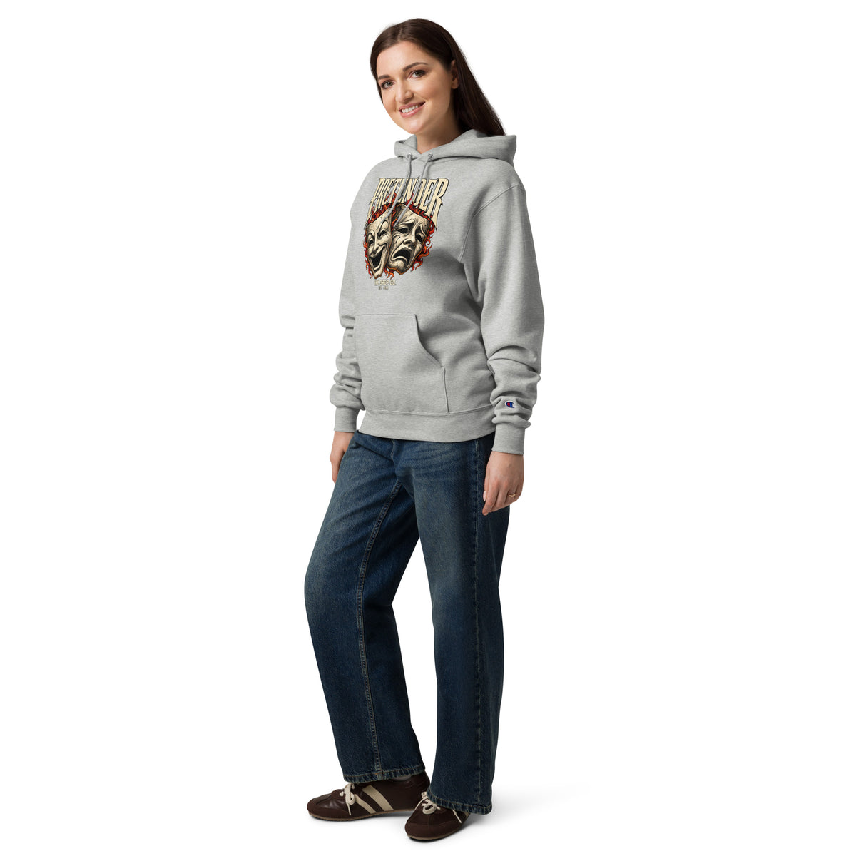 Light steel Champion hoodie shown at an angle, with theater mask chest graphic
