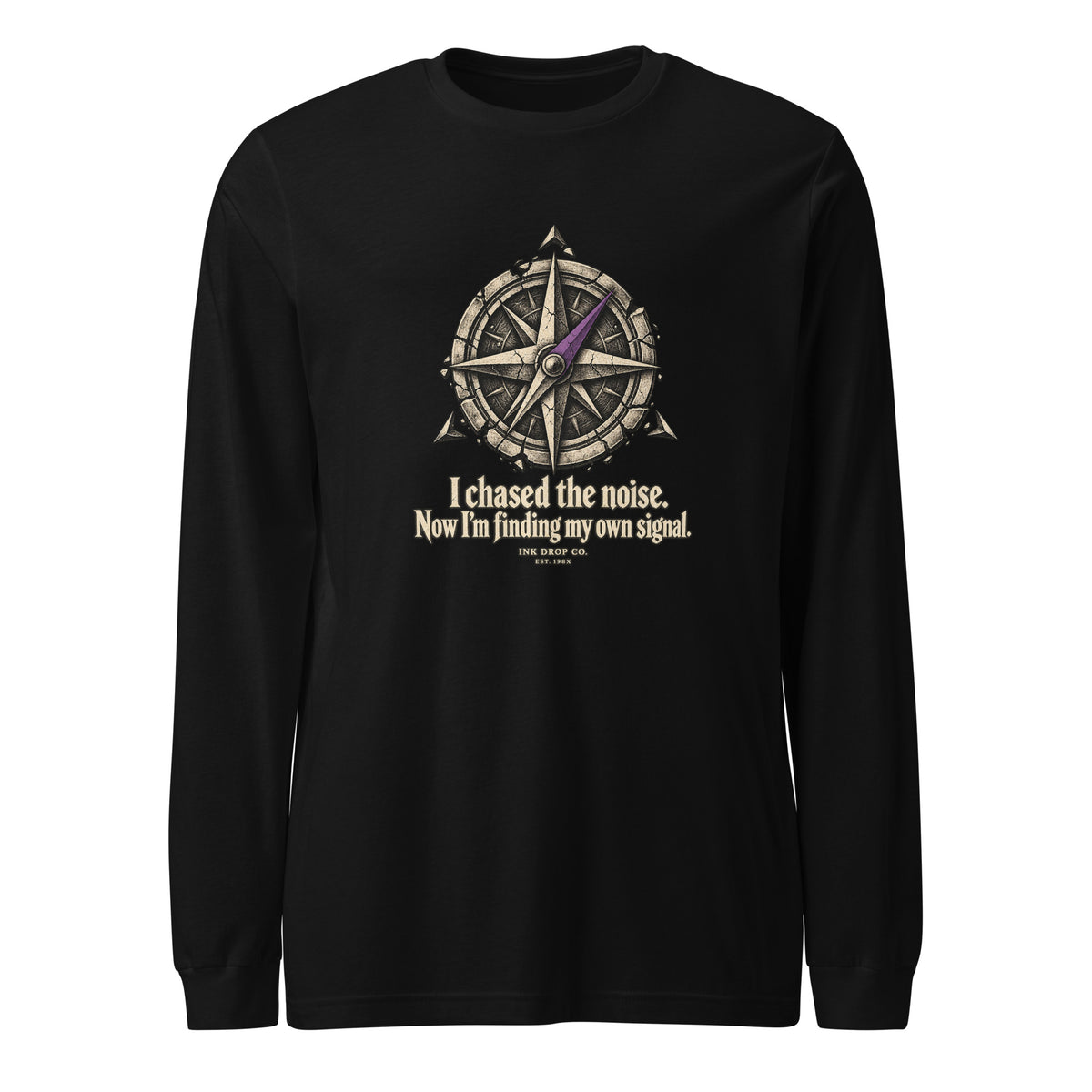 Black unisex long sleeve crewneck tee with compass-style graphic and slogan on chest