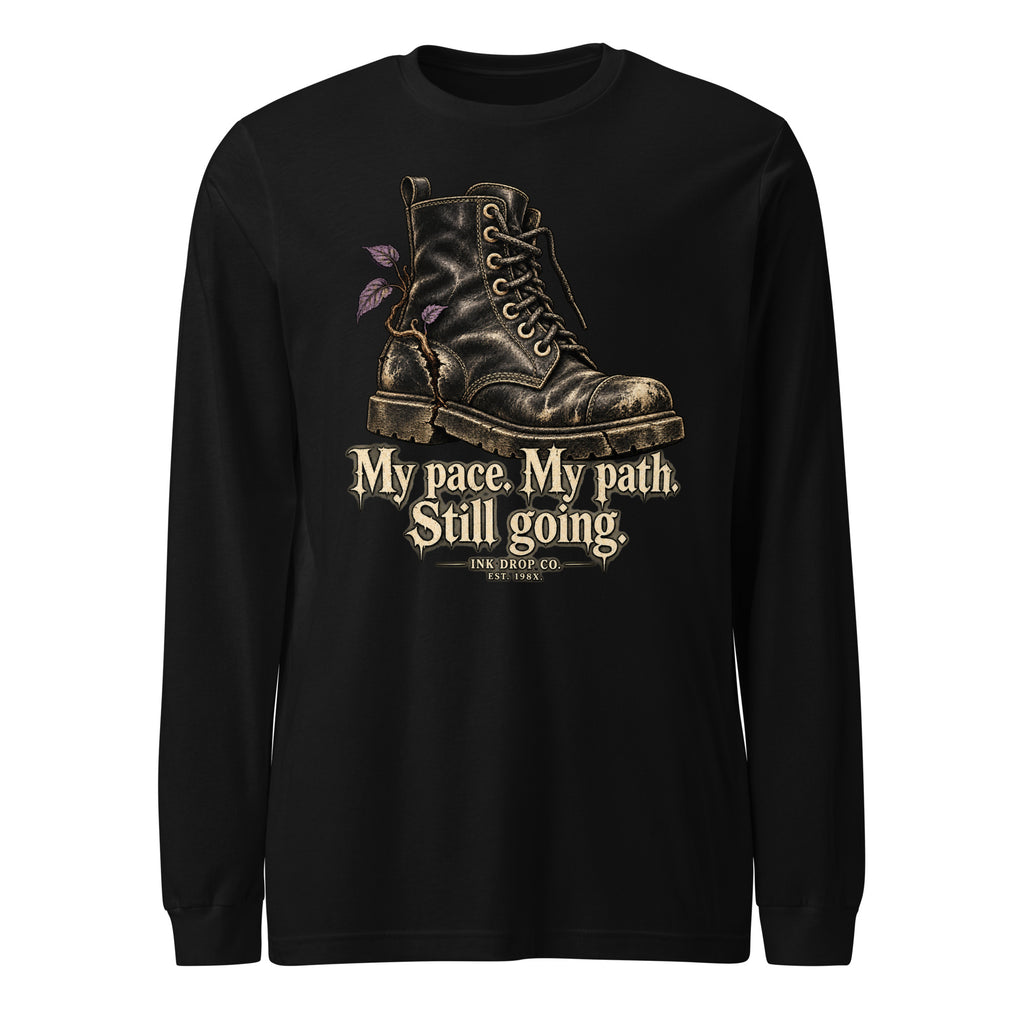 Unisex long sleeve graphic tee in black, with boot and text 'My pace. My path. Still going.'