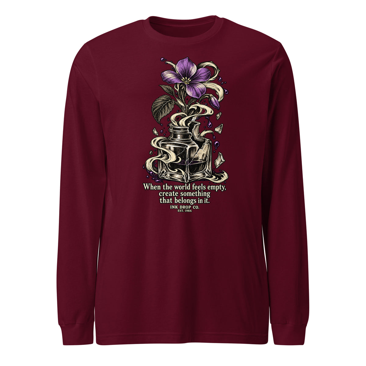 Women’s maroon long-sleeve crewneck tee with floral graphic and small text on front