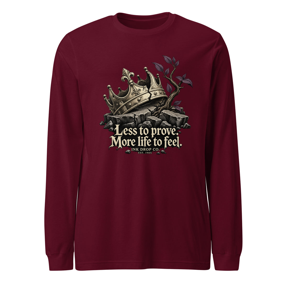 Unisex maroon long-sleeve graphic tee with crown, rocks, and quote print at center