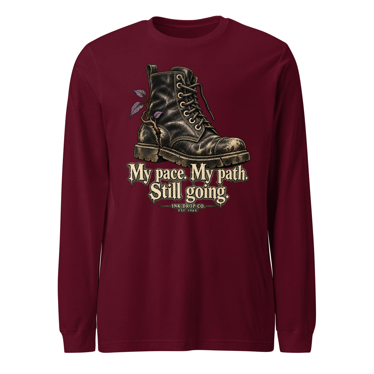 Unisex long sleeve graphic tee in maroon, with boot and text 'My pace. My path. Still going.'
