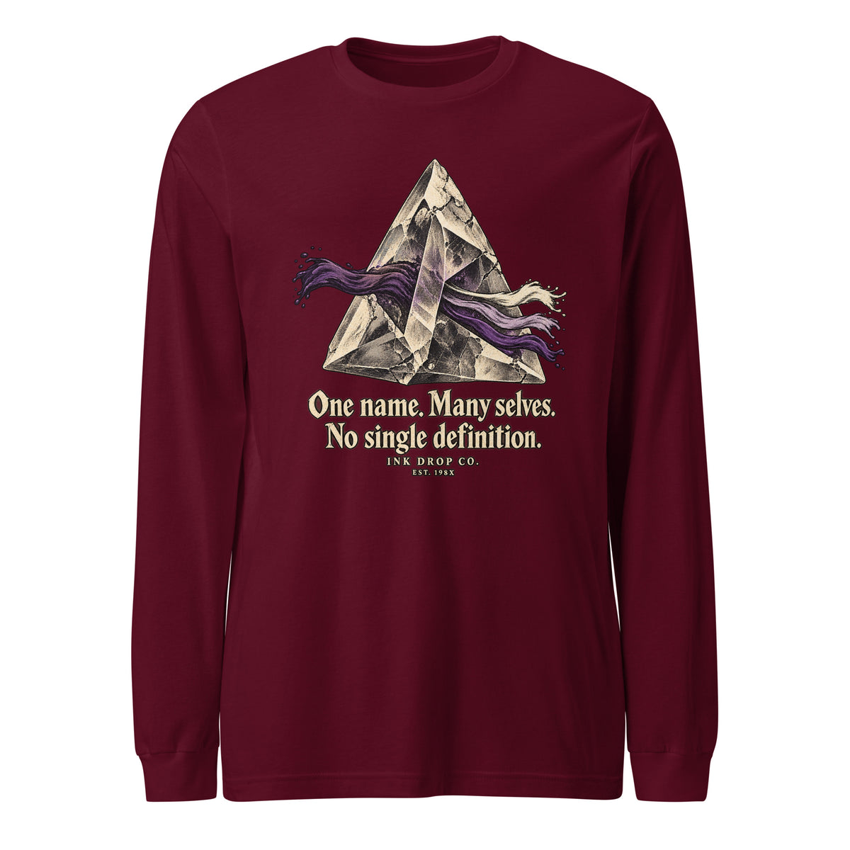 Maroon long-sleeve graphic tee with mountain illustration and 'One name. Many selves.'