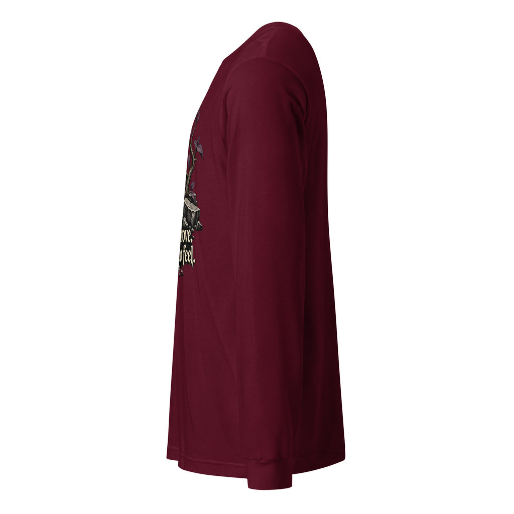 Unisex maroon long-sleeve graphic tee, side view with partial front print