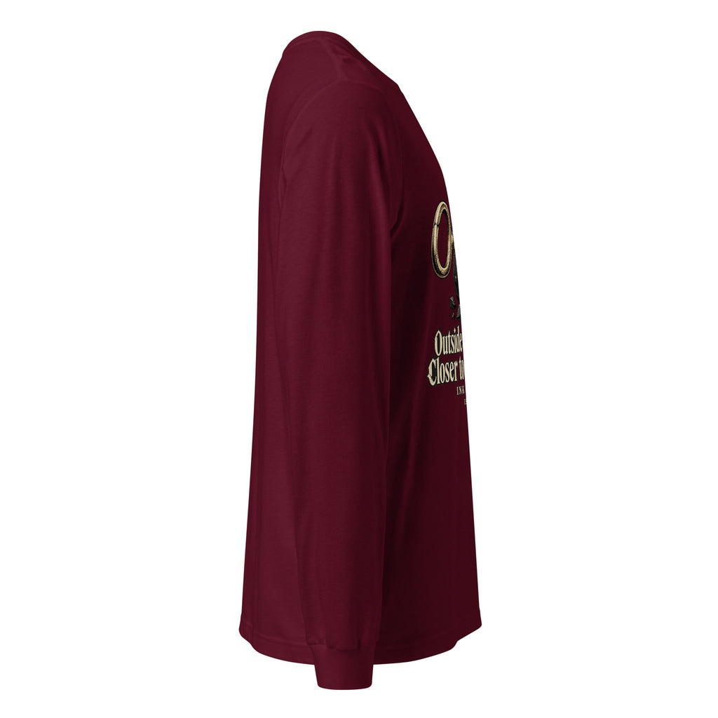 Unisex maroon long-sleeve tee, side view showing lock-and-keys graphic print