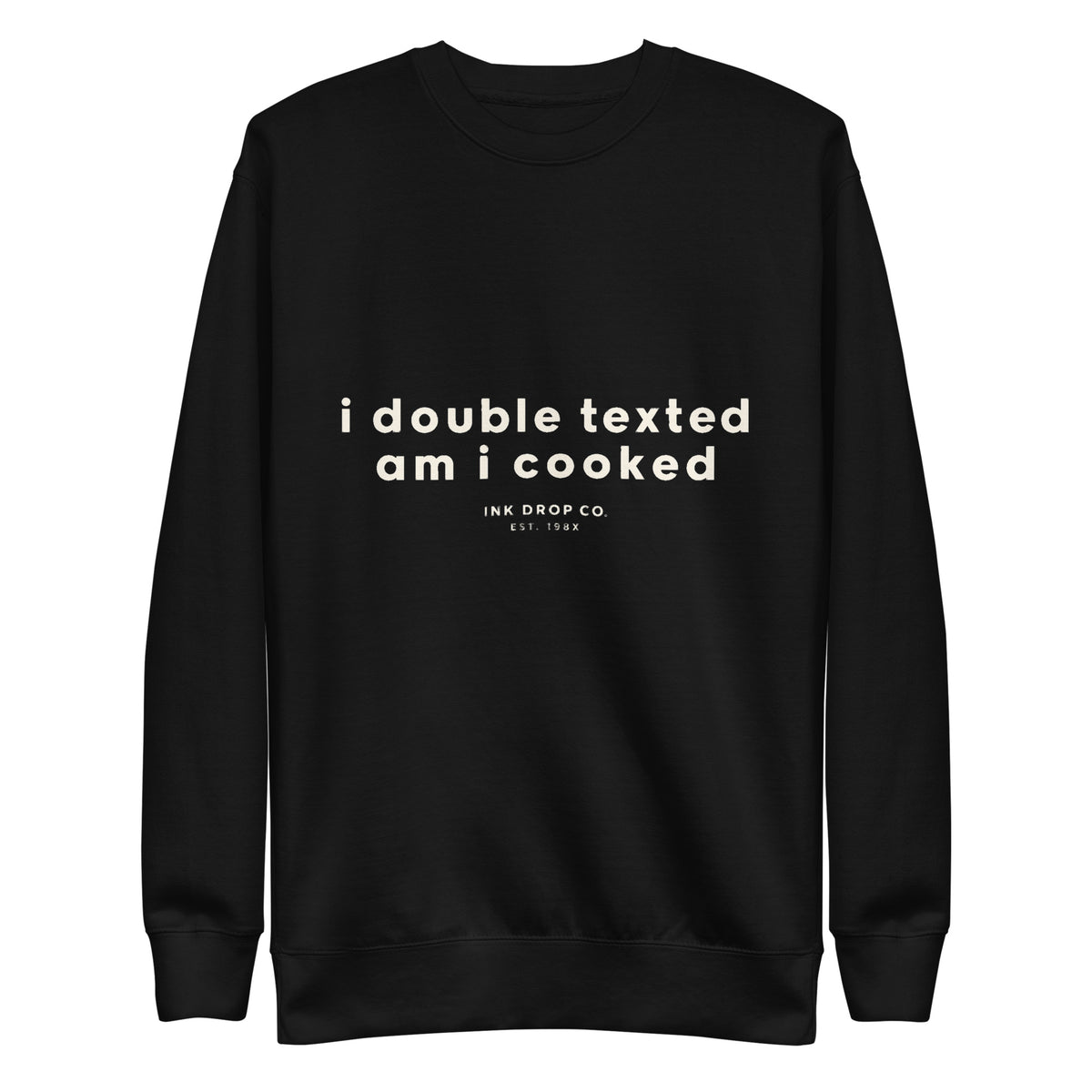 Black crewneck sweatshirt with chest graphic, long sleeves, ribbed cuffs and hem