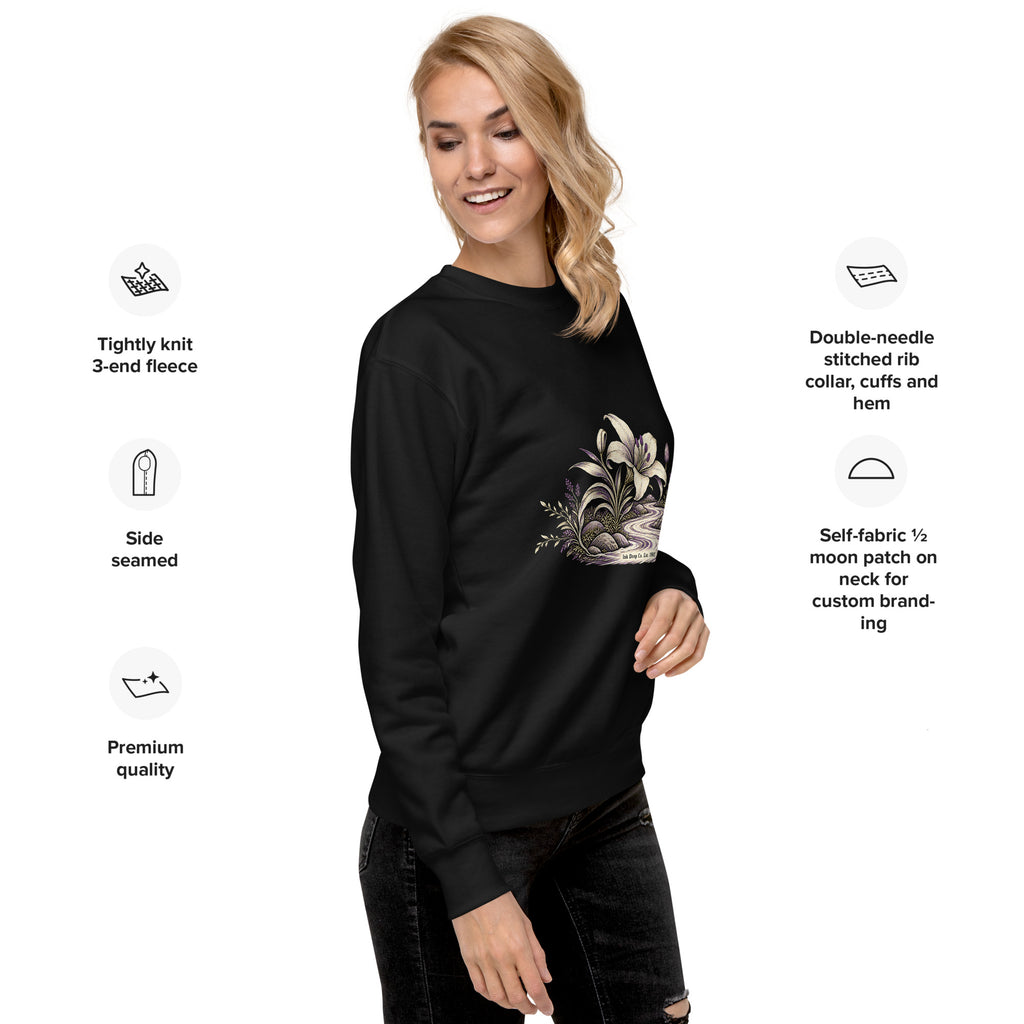 Women's crewneck sweatshirt, black with floral graphic, angled front view