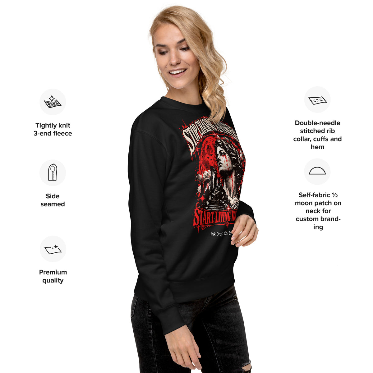 Black unisex crewneck sweatshirt on model with red/white portrait graphic on sleeve and chest