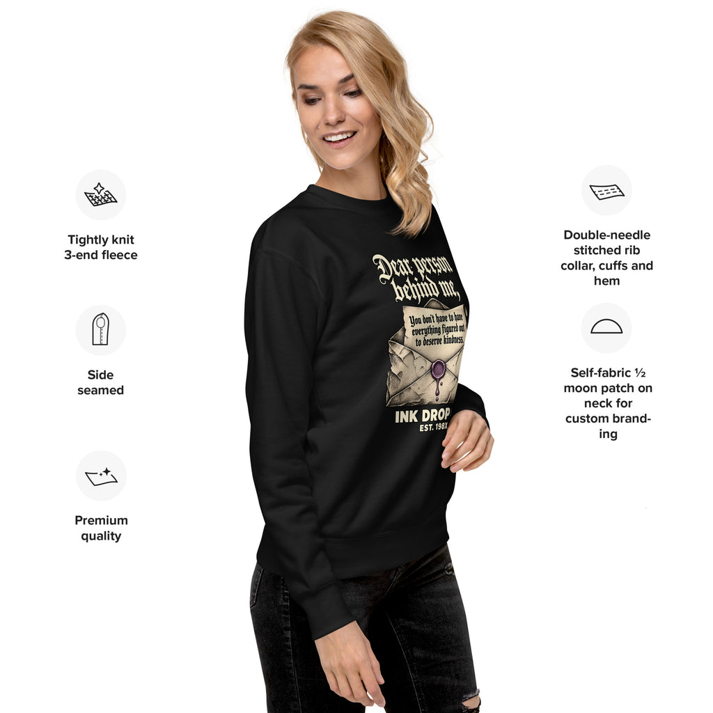 Black unisex crewneck sweatshirt angled front view with chest graphic print