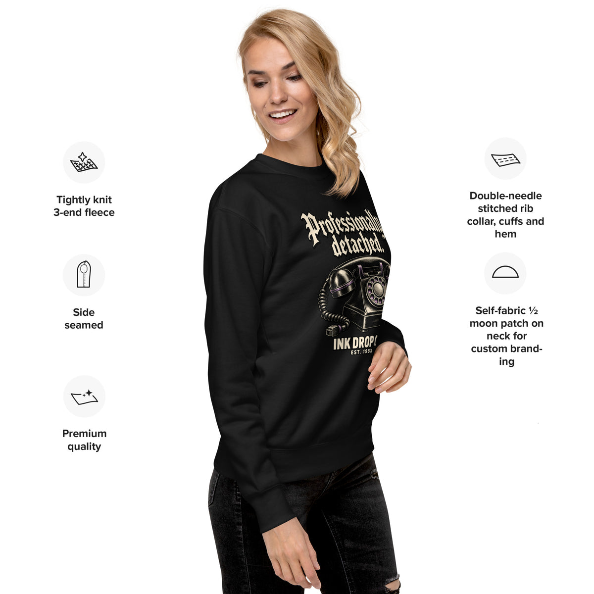 Black sweatshirt on model with front graphic print, crewneck, and long sleeves