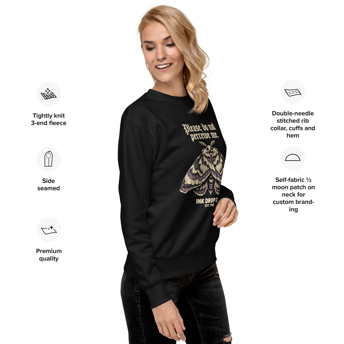 Black unisex crewneck sweatshirt on model, side view with front moth graphic