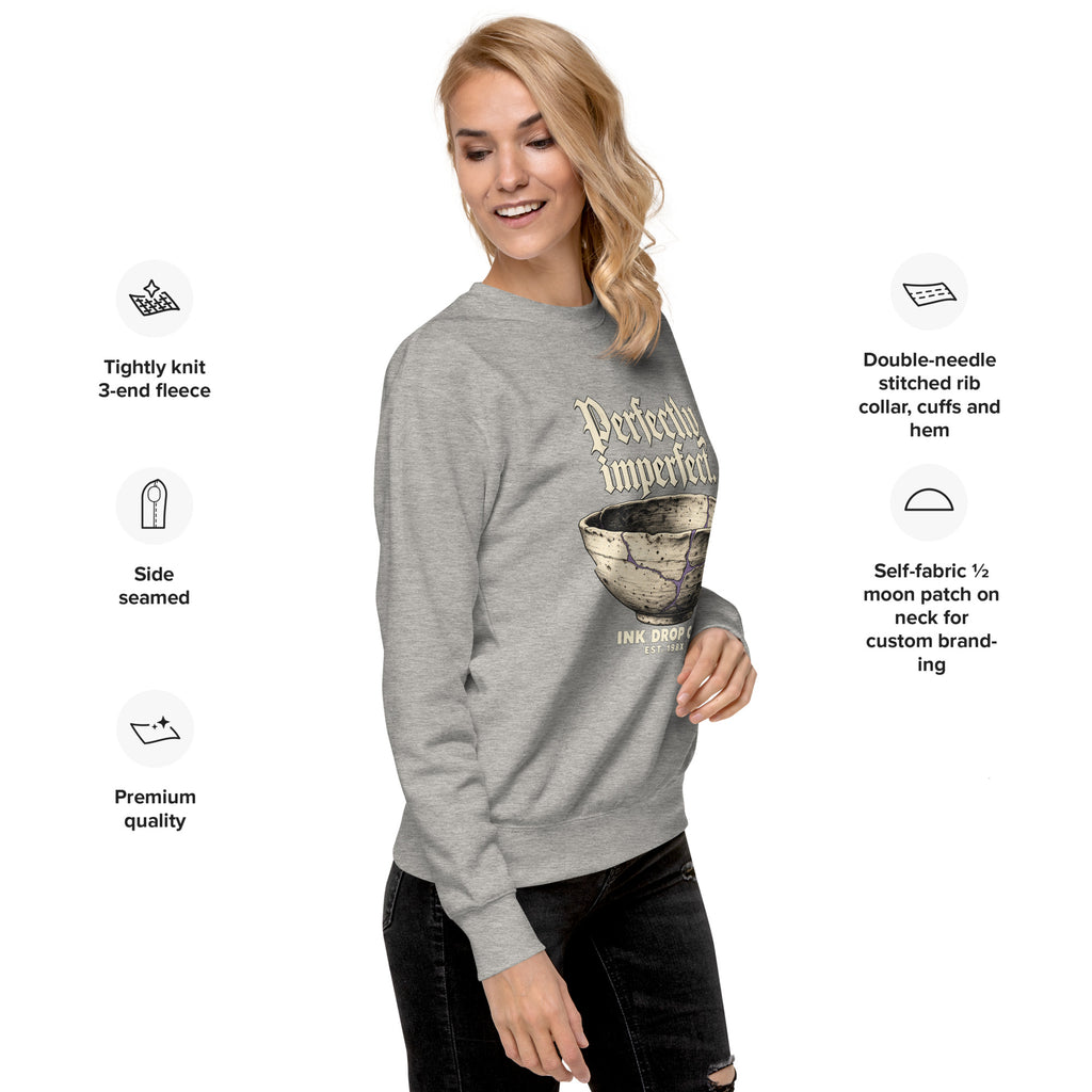 Heather grey crewneck sweatshirt with front graphic, long sleeves, side pose.