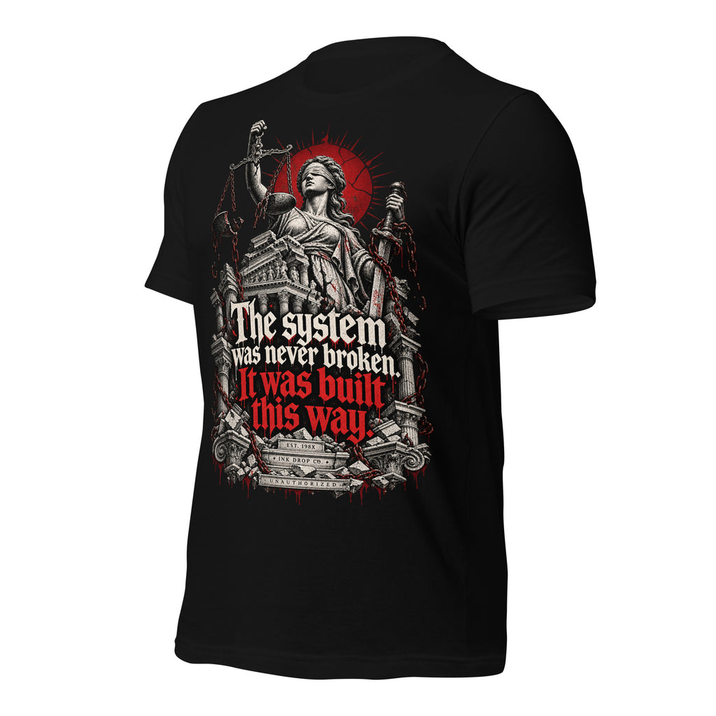 Women's black graphic justice tee, front angled view with Lady Justice scales and red text