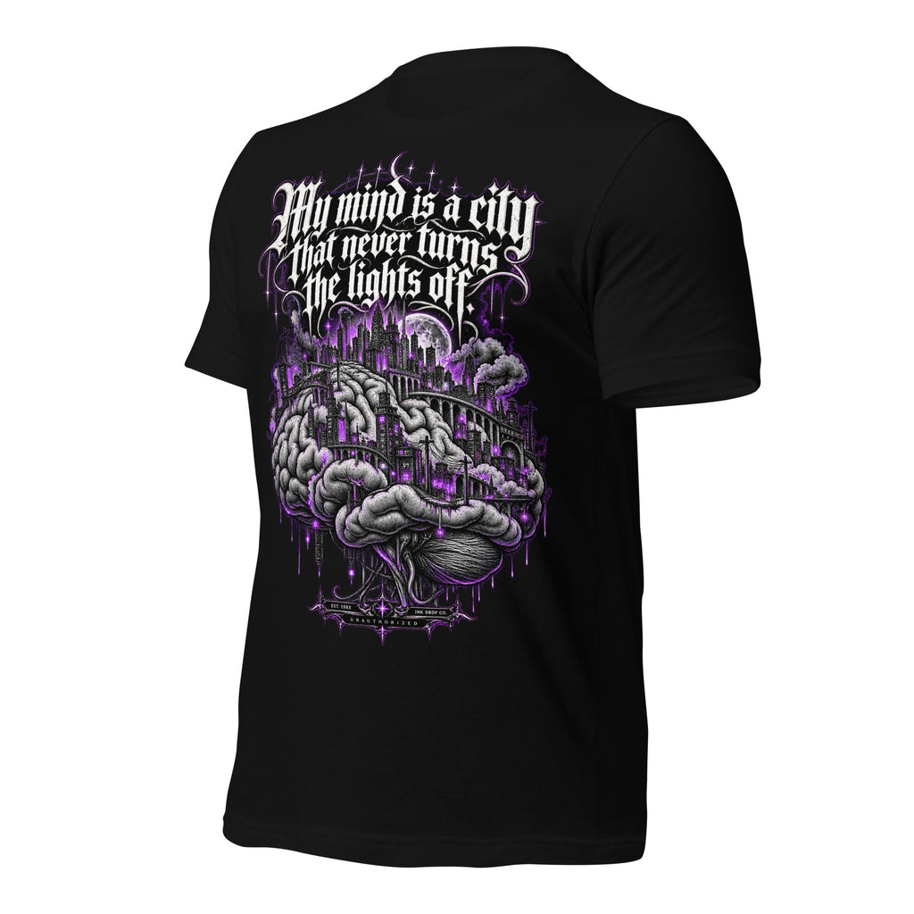 Women’s black graphic tee with large purple city-and-brain print on the back.