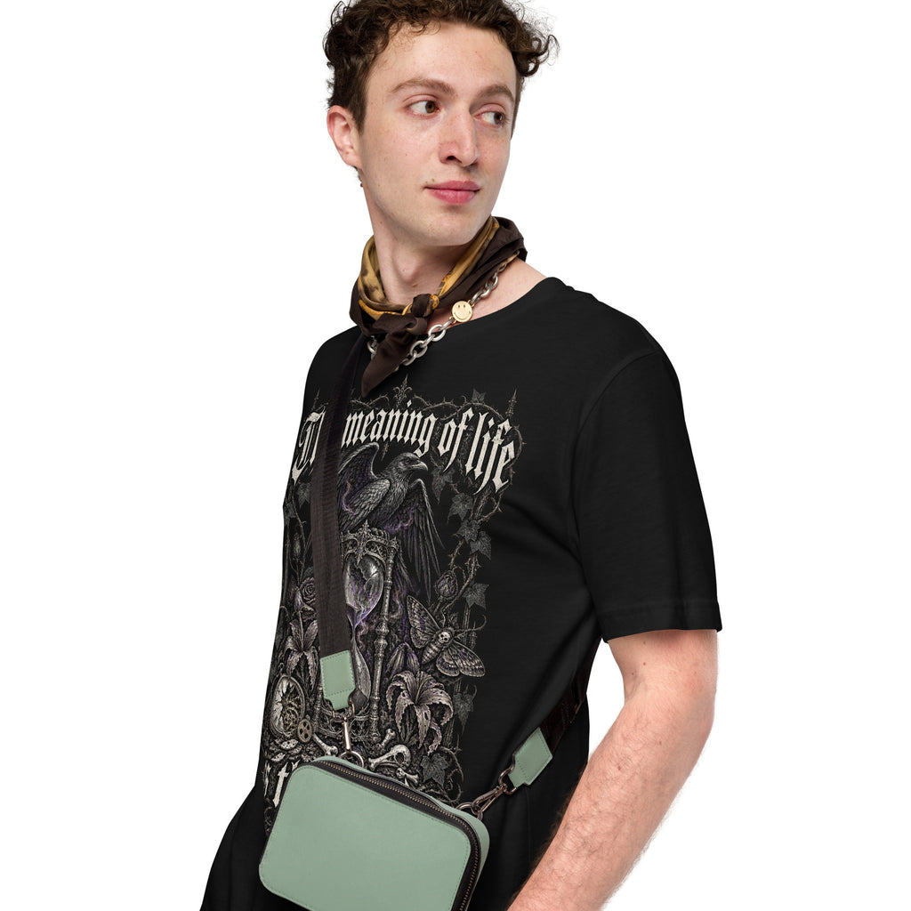 Men's black graphic tee worn by model, side view of hourglass and gothic text