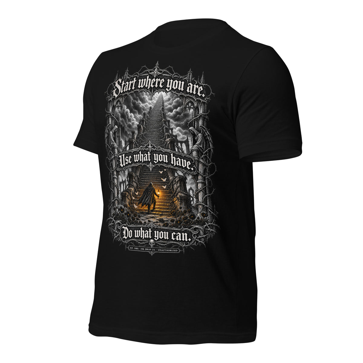 Black unisex graphic tee with angled front view of fantasy artwork and text