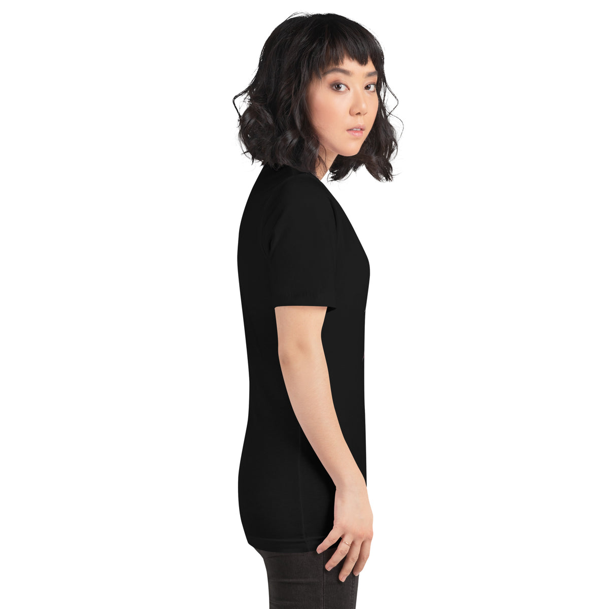 Black unisex graphic tee, side view with no visible front graphic from angle