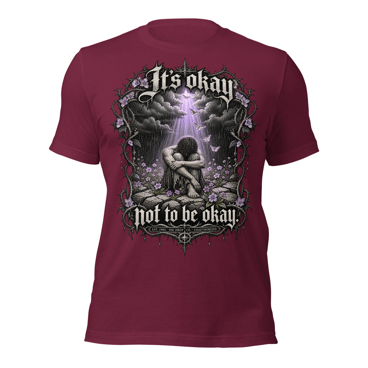 Maroon unisex graphic T-shirt with front print of clouds, flowers, and a kneeling figure
