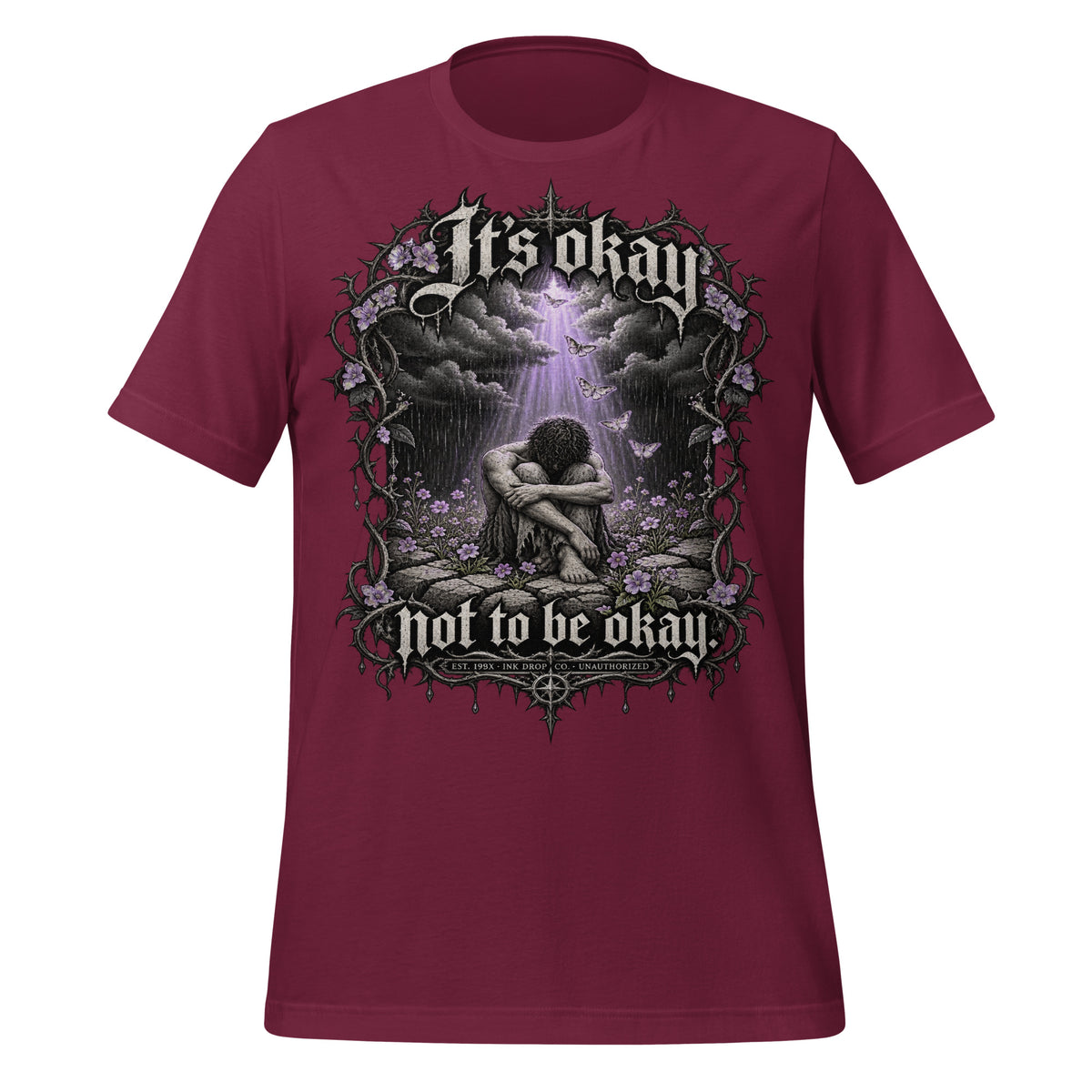 Maroon unisex graphic T-shirt with front print of a kneeling figure under a glowing arch
