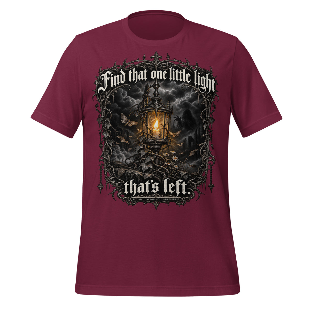 Unisex maroon graphic T-shirt with front print of glowing lantern and dark clouds