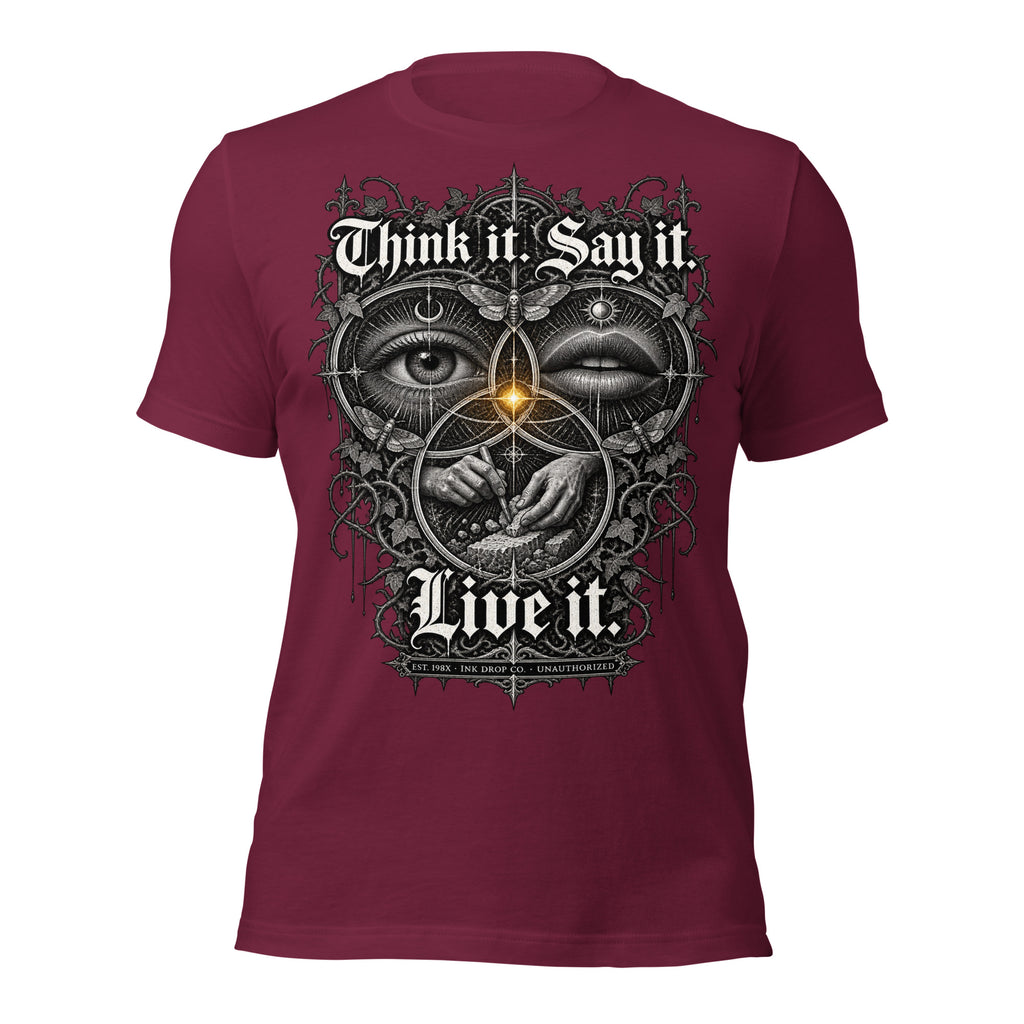 Maroon unisex graphic tee with front 'Think it Say it Live it' face-eye graphic